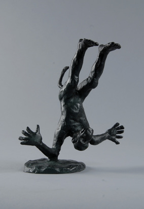 Untitled (Monkey Head Over Heal on One Elbow)