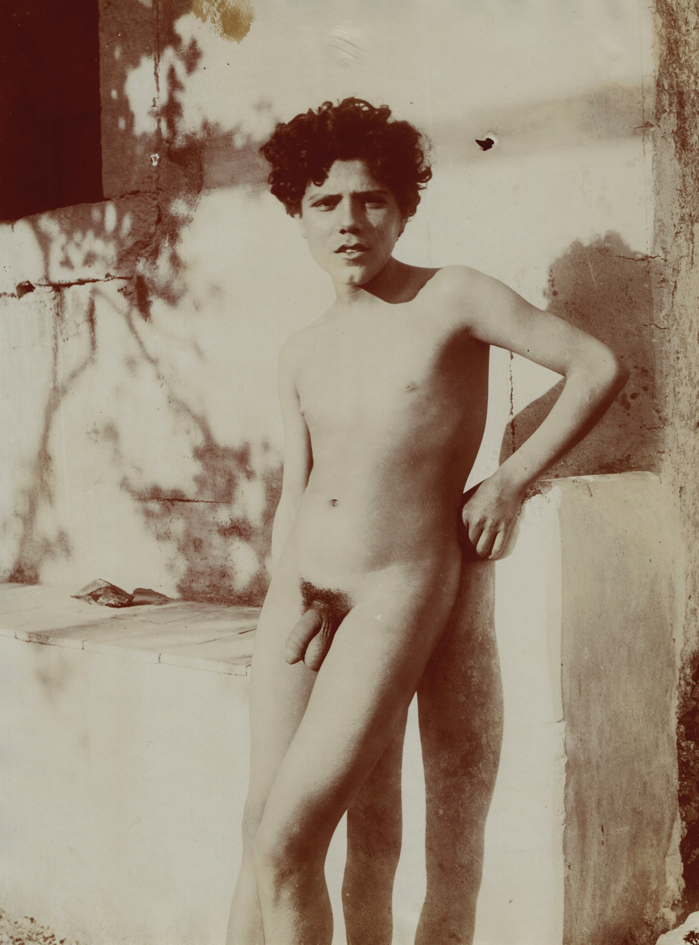 Wilhelm von Gloeden, 3 photographs: Sicilian Boy Posing at a Boat; Nude Young Male at the Monte Ziretto, approx. 1890; Sicilian Boy Posing at a Wall, approx. 1900