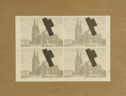 Halbiertes Filzkreuz über Köln