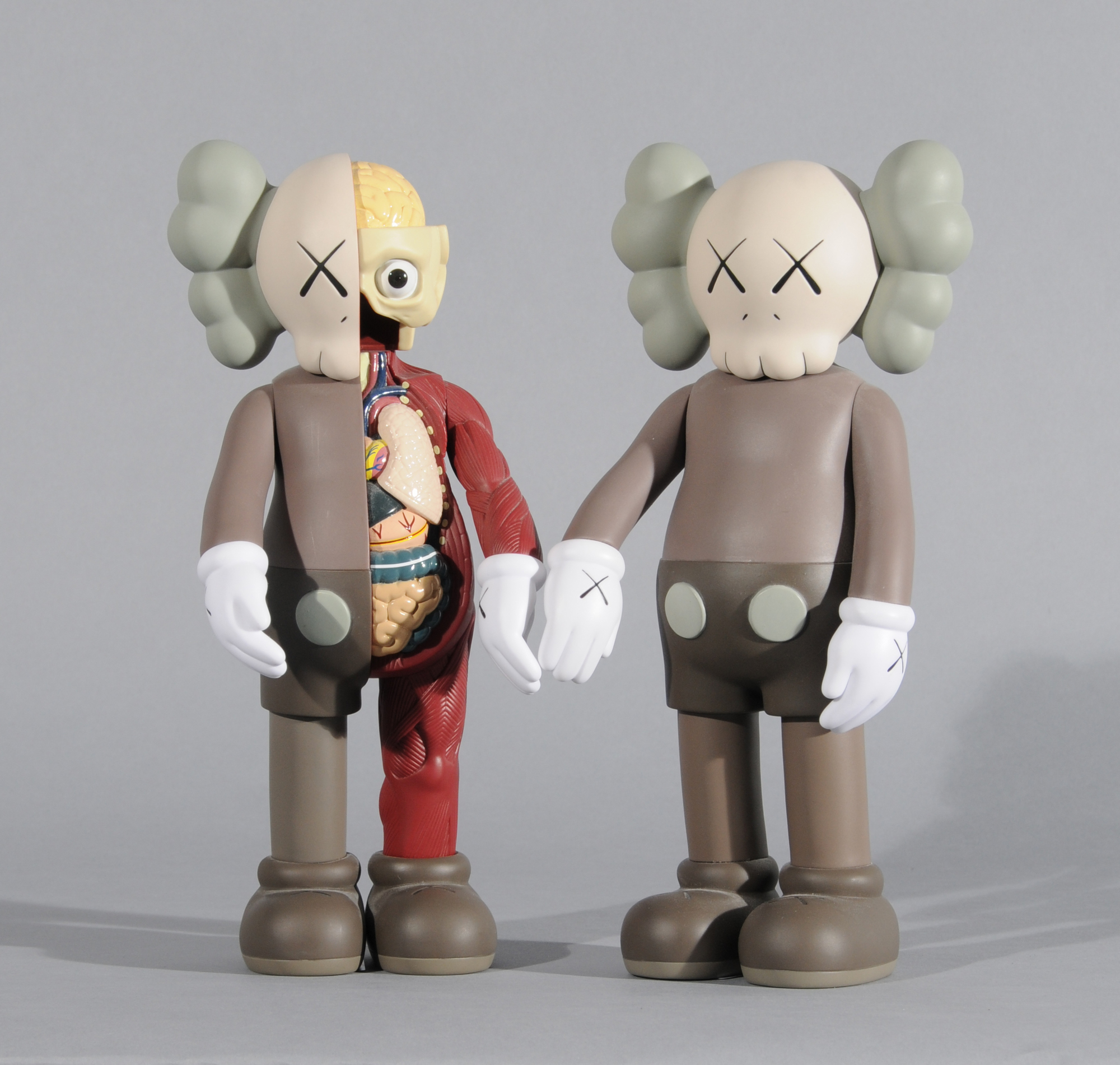 KAWS (Brian Donnelly), 2 multiples: Companion (Brown); Companion Flayed (Brown)