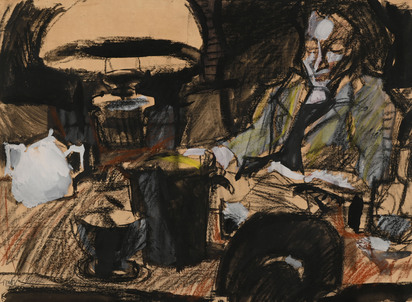 Woman sitting at a laid table