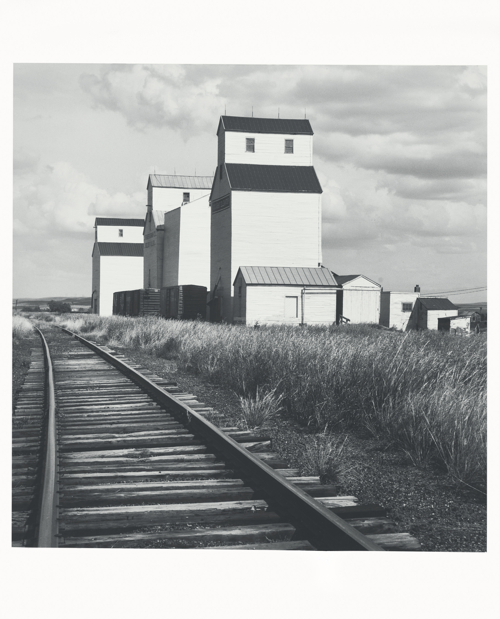 David Plowden, 2 works: Golden Valley, North Dakota, 1972; Statue of Liberty from Caven Point Rond, Jersey City, New Jersey, 1967
