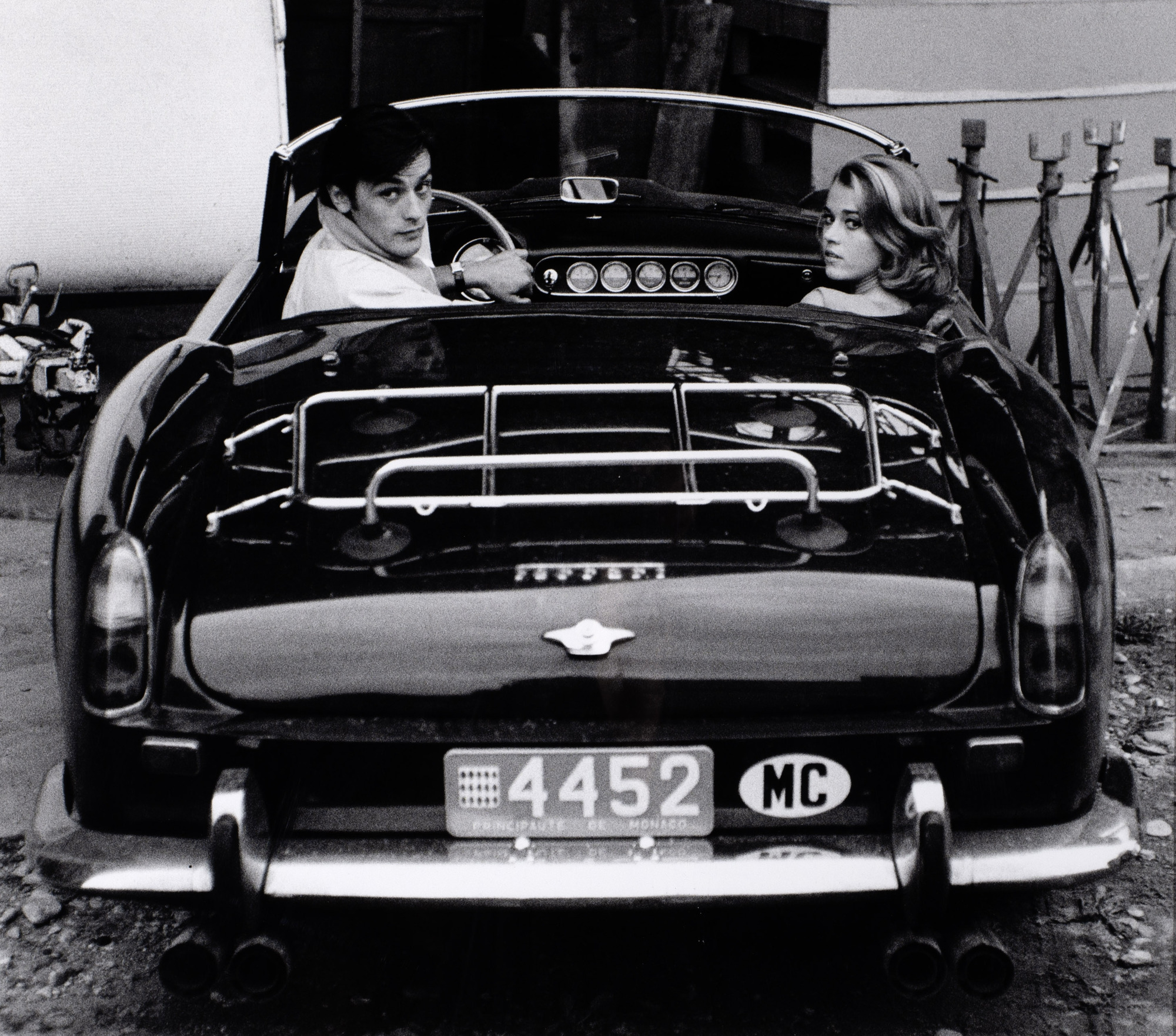 Edward Quinn, Alain Delon and Jane Fonda in a Ferrari 250GT Spider California on the Set of Joy House, Antibes